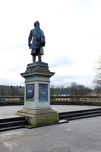 Saltaire, UK 01 10 2024 : Sculpture of Sir Titus Salt who created a mill village outside Bradford to improve the lives of his workers in victorian times. The site is now a unesco world heritage site.