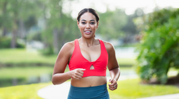 istock Young multiracial woman running or jogging 1923005460