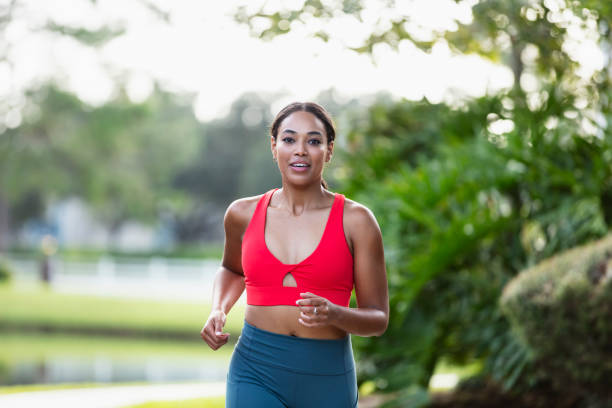 Young multiracial woman running or jogging