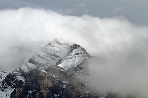 Cloud shrouded mountain peak in the Lost River Range of Idaho.