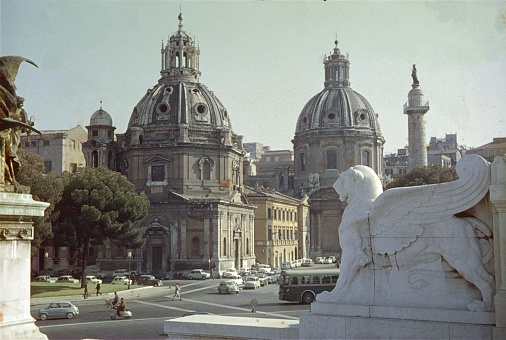 Rome, Lazio, Italy, 1959. Street scene in Piazza Venezia with the Santa Maria di Loreto church.