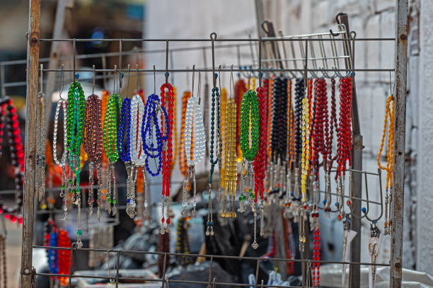 istock Colourful rosaries on the street vendor's stall. 1923112355