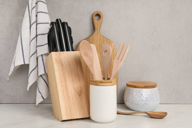 istock Set of different kitchen utensils on white near gray wall 1923117040