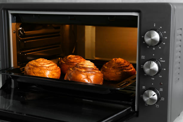 istock Open electric oven with delicious sweet pastry 1923117552
