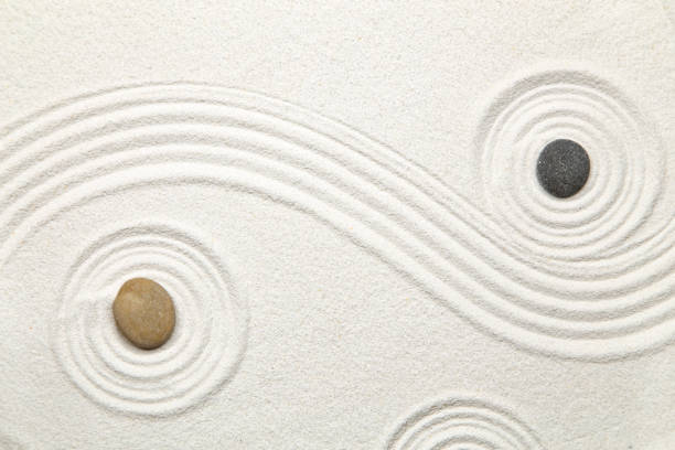 Zen garden Zen garden with the stones and white sand pattern spiral rock stock pictures, royalty-free photos & images