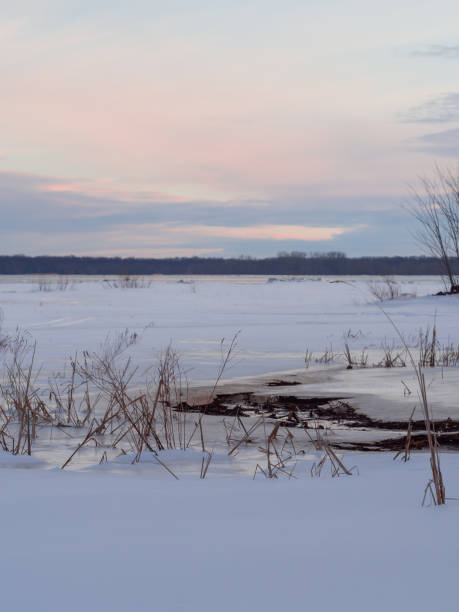 istock Landscape with a watercourse and snow 1923264577