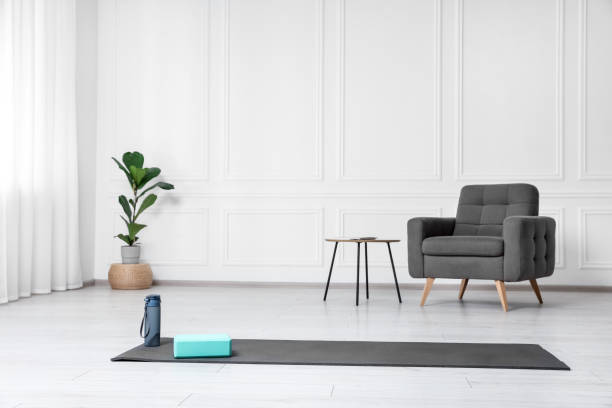 istock Exercise mat, yoga block and bottle indoors. Space for text 1923266678
