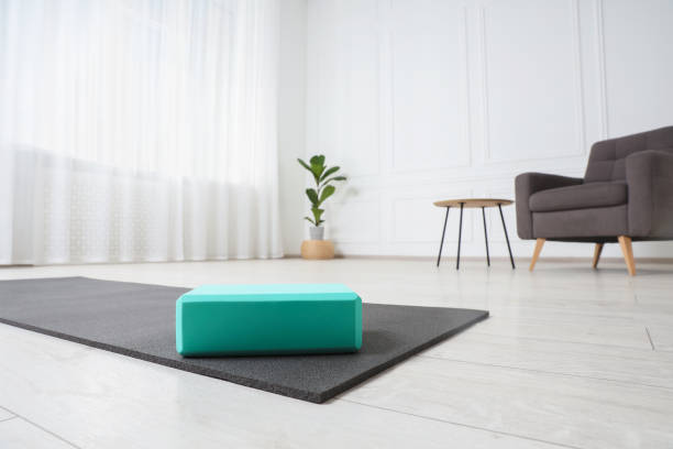 istock Exercise mat and yoga block indoors, low angle view 1923266682