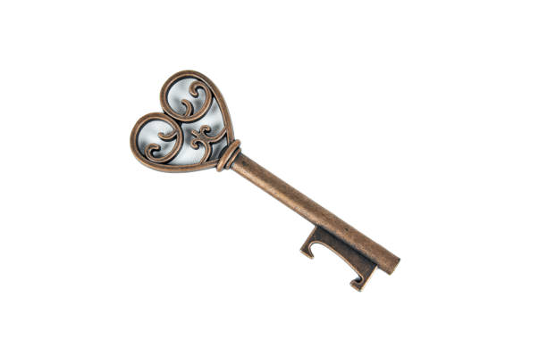 istock Antique old key on white background 1923306615
