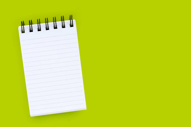 istock To do list note book on green background. 1923309200