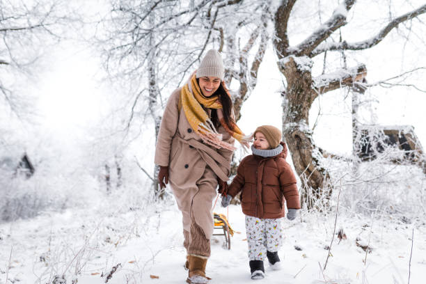 istock Having fun on the snow with our sleds 1923342130
