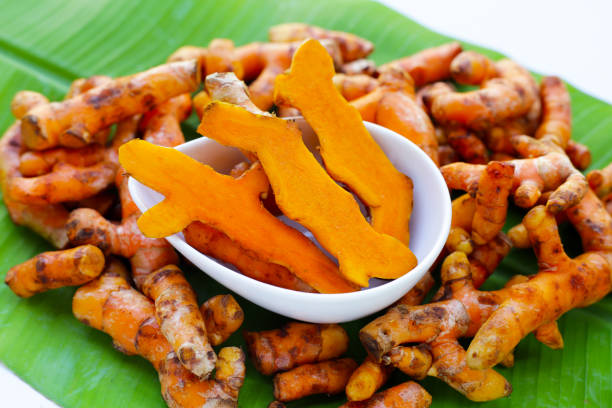 istock Turmeric roots on banana leaf 1923389240