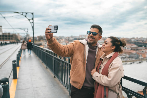 istock Couple taking selfie on the Luis I Bridge 1923465548