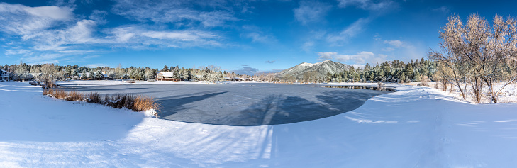 People don't normally think of Arizona as a place that gets much snow in the winter.  This scene of snow and ice on a lake was photographed in Northern Arizona at the town of Flagstaff.  At 7000 feet elevation, snow falls often here in the winter, sometimes accumulating one to two feet at a time.