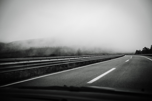 concrete road, north macedonian highway on a foggy day