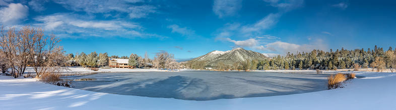People don't normally think of Arizona as a place that gets much snow in the winter.  This scene of snow and ice on a lake was photographed in Northern Arizona at the town of Flagstaff.  At 7000 feet elevation, snow falls often here in the winter, sometimes accumulating one to two feet at a time.