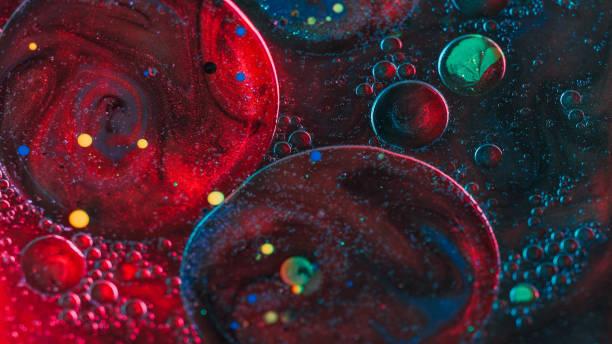 istock Abstract background paint glitter purple red spots 1923507539