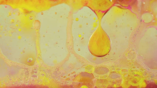 istock Bubble fluid oil texture paint water drop yellow 1923507568