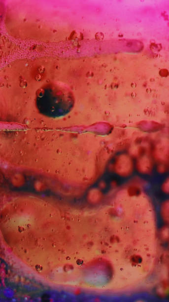 istock Bubble fluid oil texture paint water drop red pink 1923507569