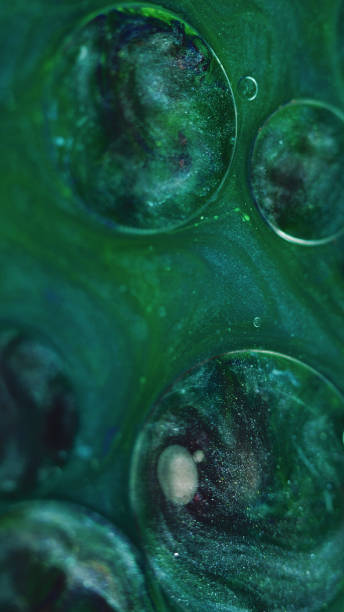 istock Abstract background shimmering mix oil ink green 1923508097