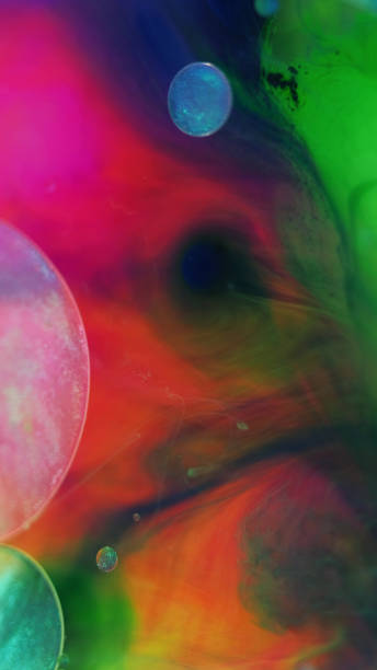 istock Glitter bubbles color mist paint water ink sphere 1923508100