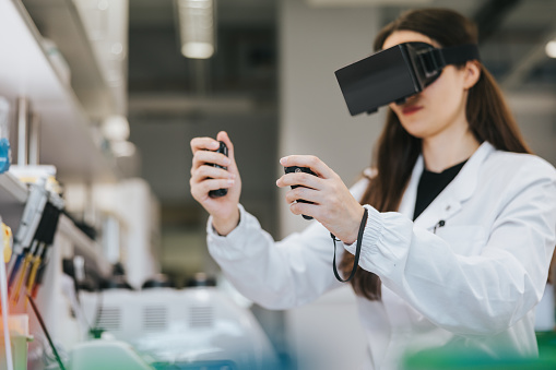 A scientist wearing prototype VR goggles, their hands gesturing in the air as they interact with virtual elements, blending the boundaries between the real and digital worlds