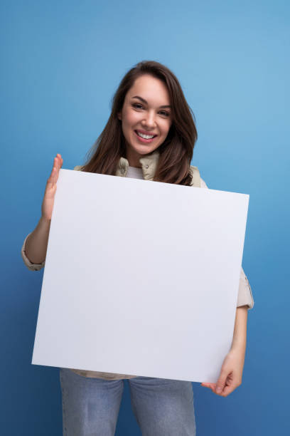 istock white board mockup for pasting information in woman hands 1923522058