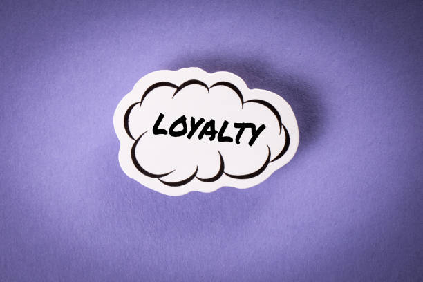 istock LOYALTY Concept. Speech bubble with text on a purple background 1923535286