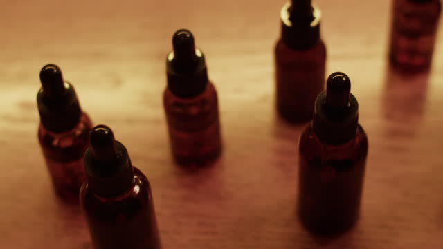 Bottles of various fragrant oils in lab