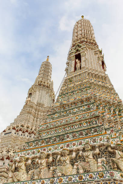 istock Wat Arun temple in a blue sky in Bangkok, Thailand. 1923610439