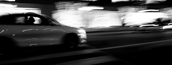 Car at night. Shooting with a monochrom camera. 
Authentic photography without AI