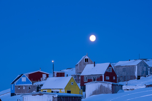 Colourful village in winter, Kulusuk, Eastern Greenland