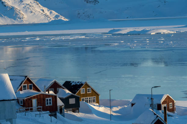 istock Colourful village in winter 1923659705