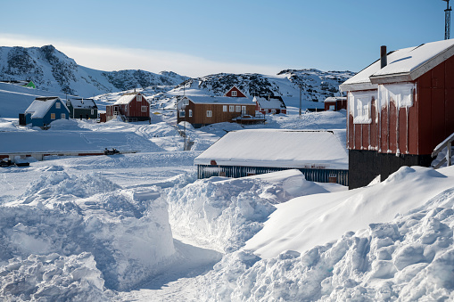 Village and snow drifts in winter, Kulusuk, Eastern Greenland