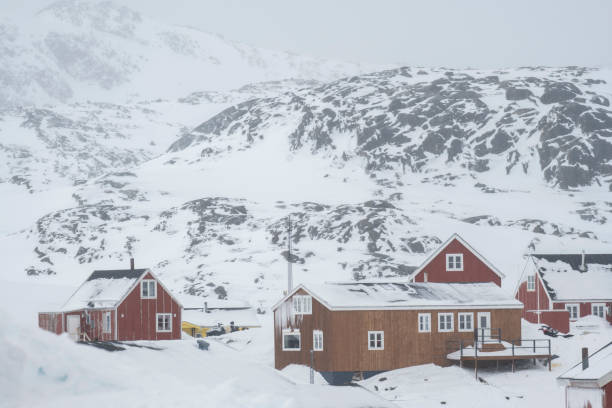 istock Village and mountain in snowstorm 1923666555