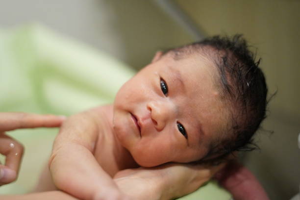 istock Baby comfortably taking a bath 1923733915