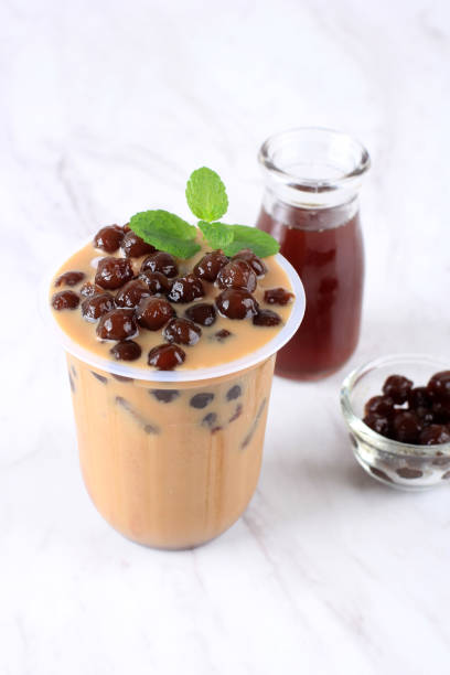 istock Taiwan Ice  Milk Chocolate or Coffee with Boba Tapioca Pearls on Top with Mint Leaf as Garnish 1923784630