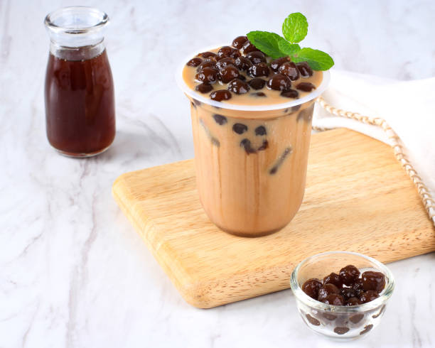 istock Taiwan Ice  Milk Chocolate or Coffee with Boba Tapioca Pearls on Top with Mint Leaf as Garnish 1923784632