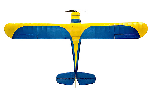 Vintage remote controlled airplane on white background