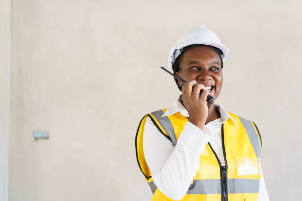 istock Female foreman inspecting a construction works. 1923823483