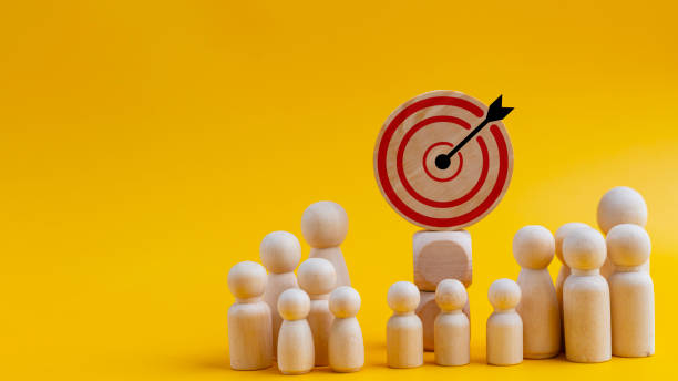 istock Concept of achieving goals by cooperating with team members with a human icon for customer focus target group and customer relation management concept. 1923832167