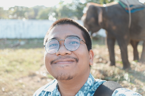happy man with elephant