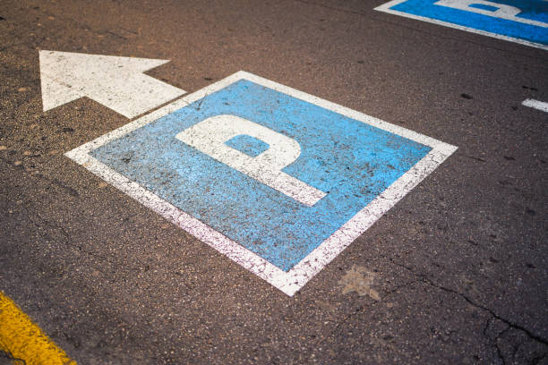 parking sign on asphalt