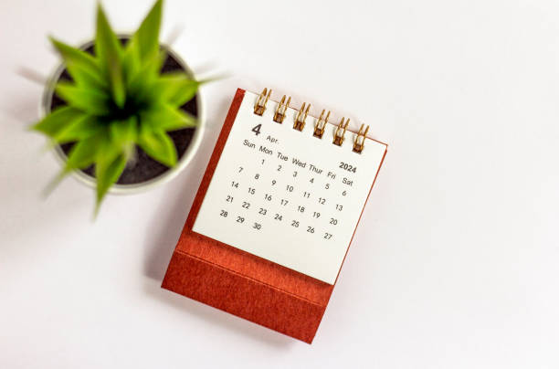 istock Desk calendar for April 2024 on a white background. 1923998805