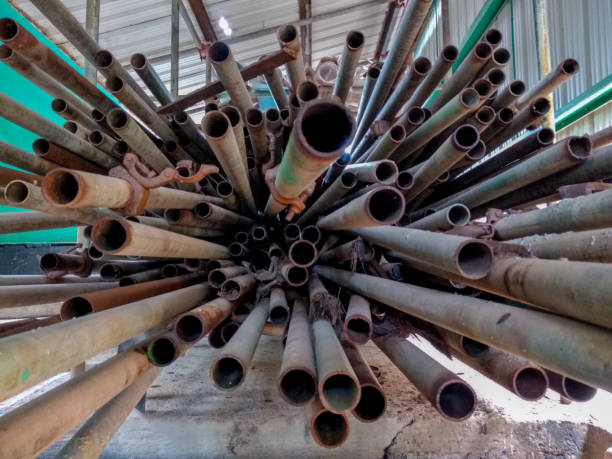 istock pile of used scaffolding poles 1924015523
