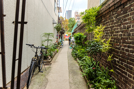 2023-11-11 Osaka, Japan. A narrow alleyway in Osaka, Japan