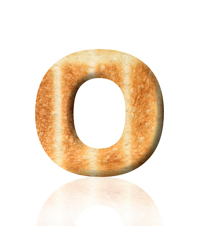Close-up of three-dimensional toasted bread alphabet letter O on white background.