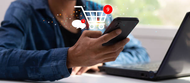 istock man hand using smartphone with shopping cart and chat icon with happy order during sitting at home 1924074445