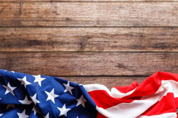 istock American flag on a old wooden 1924111329