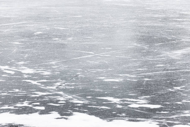 Frozen river surface in winter season, natural background texture